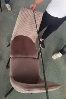 Upholstery wrinkle recorded during inspection